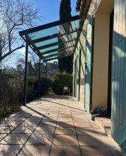 installation d'une pergola vitrée  près de Grans