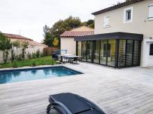 Création et installation d'une véranda grise anthracite de la marque Technal vers Allauch