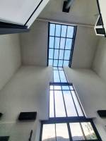 Installation d'une immense verrière en aluminium Technal près d'Aix en Provence