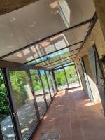 Véranda gris anthracite en aluminium Technal près de Fuveau